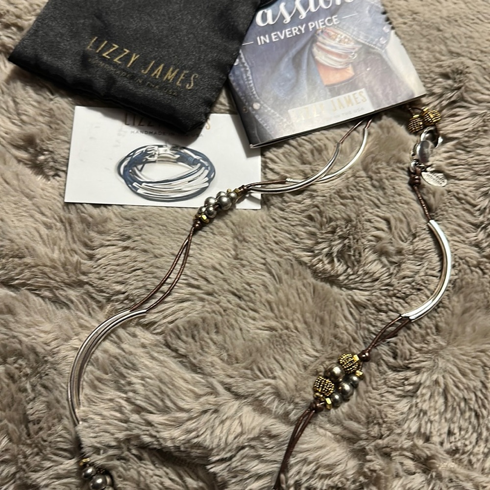 Liszt James wrap bracelet/ necklace silver / gold w/ brown cord.